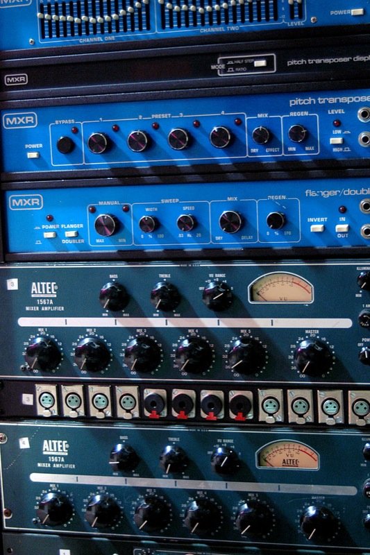 Two Altec 1567A mixer amplifiers racked at Savage Audio, alongside MXR outboard units