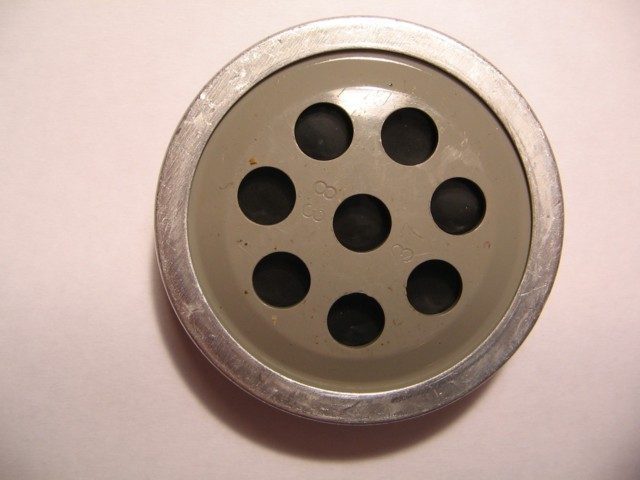 Carbon-button microphone capsule from a Western Electric telephone